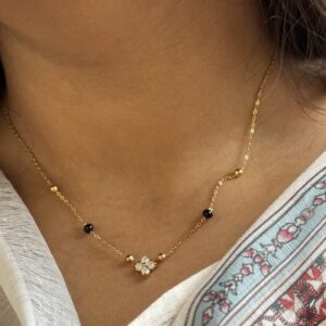 anti tarnish modern gold mangalsutra necklace with black beads for women, modern anti tarnish gold mangalsutra with black beads, waterproof daily wear mangalsutra necklace for women, elegant gold finish anti tarnish mangalsutra, stylish black bead mangalsutra for everyday wear, minimal modern mangalsutra necklace in gold finish, anti tarnish mangalsutra jewellery for women, lightweight waterproof gold mangalsutra necklace