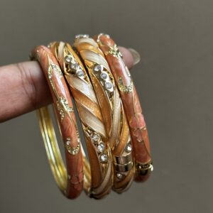 enamel bangles, enamel bangles for women, colourful enamel bangles, brass enamel bangles, designer enamel bangles, enamel jewellery, trendy bangles for women, enamel bangles online, colourful bangles online India, lightweight enamel bangles, traditional enamel bangles, modern enamel bangles, stackable enamel bangles, festive bangles for women, statement bangles for women, brass bangles for women, Indian bangles, ethnic jewellery, colourful jewellery, women’s jewellery